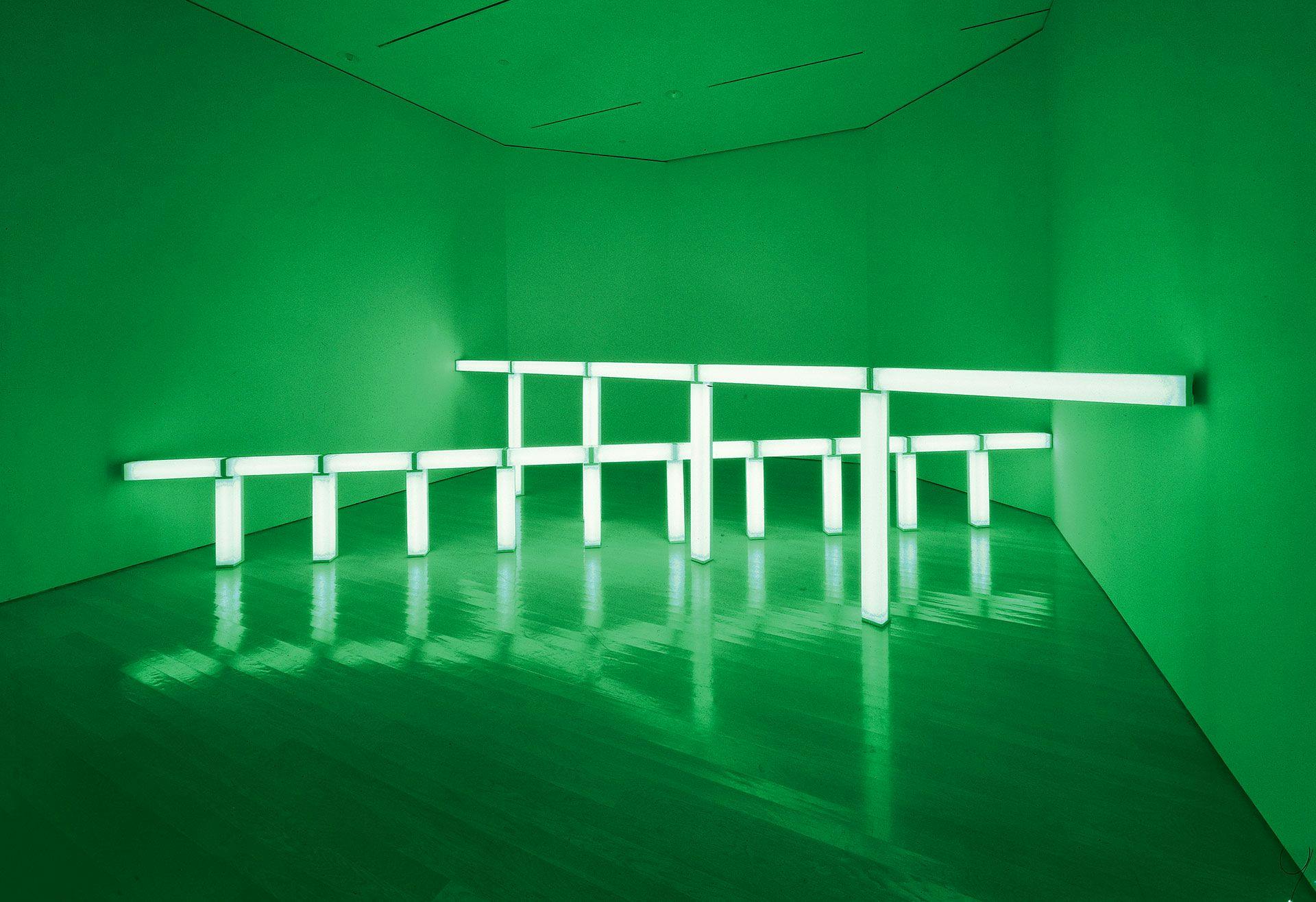 A sculpture in green fluorescent light by Dan Flavin, titled greens crossing greens (to Piet Mondrian who lacked green), dated 1966.